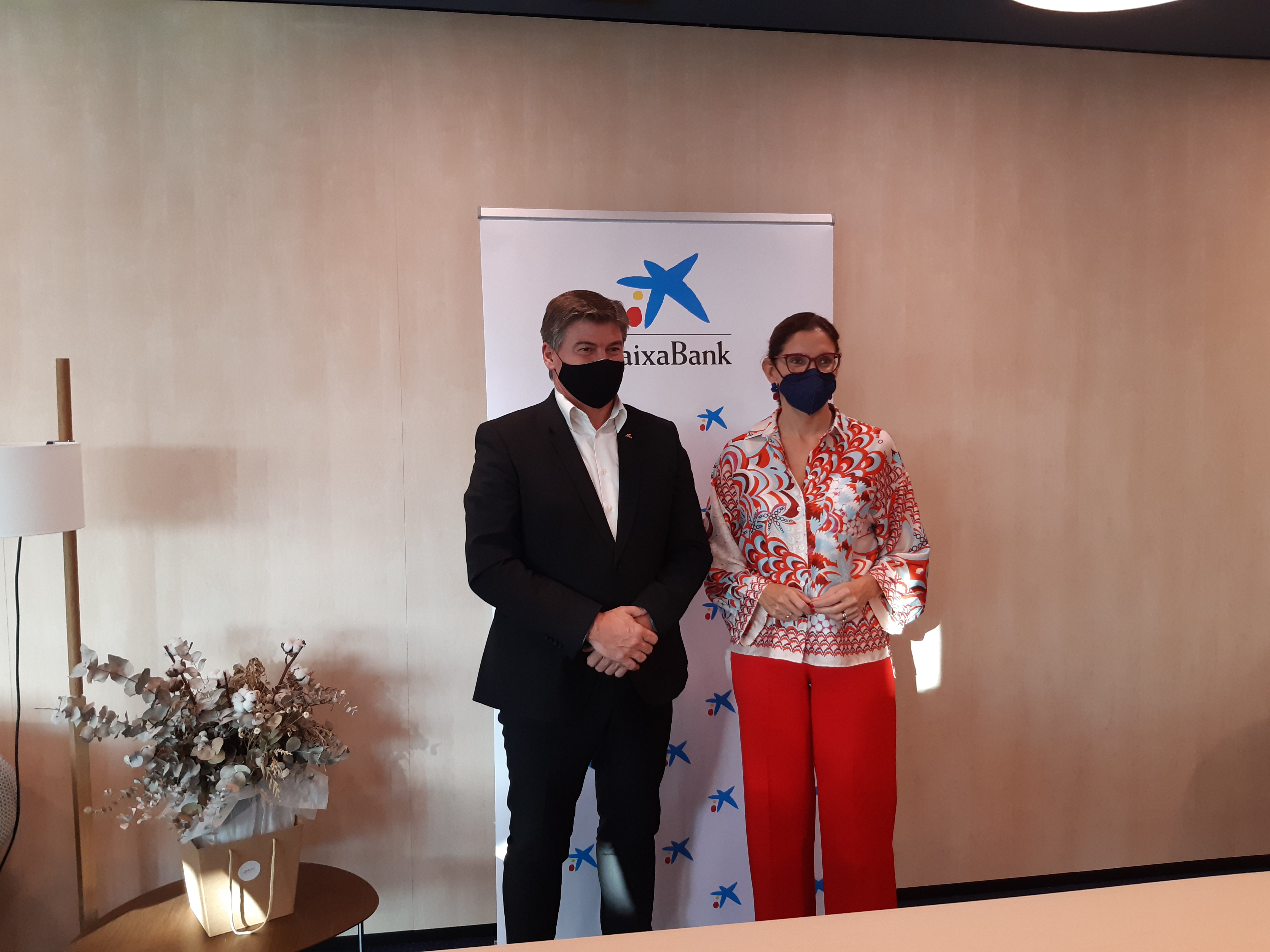 Antoni Cañete, presidente de PIMEC, y Maria Alsina, directora territorial de CaixaBank en Barcelona
