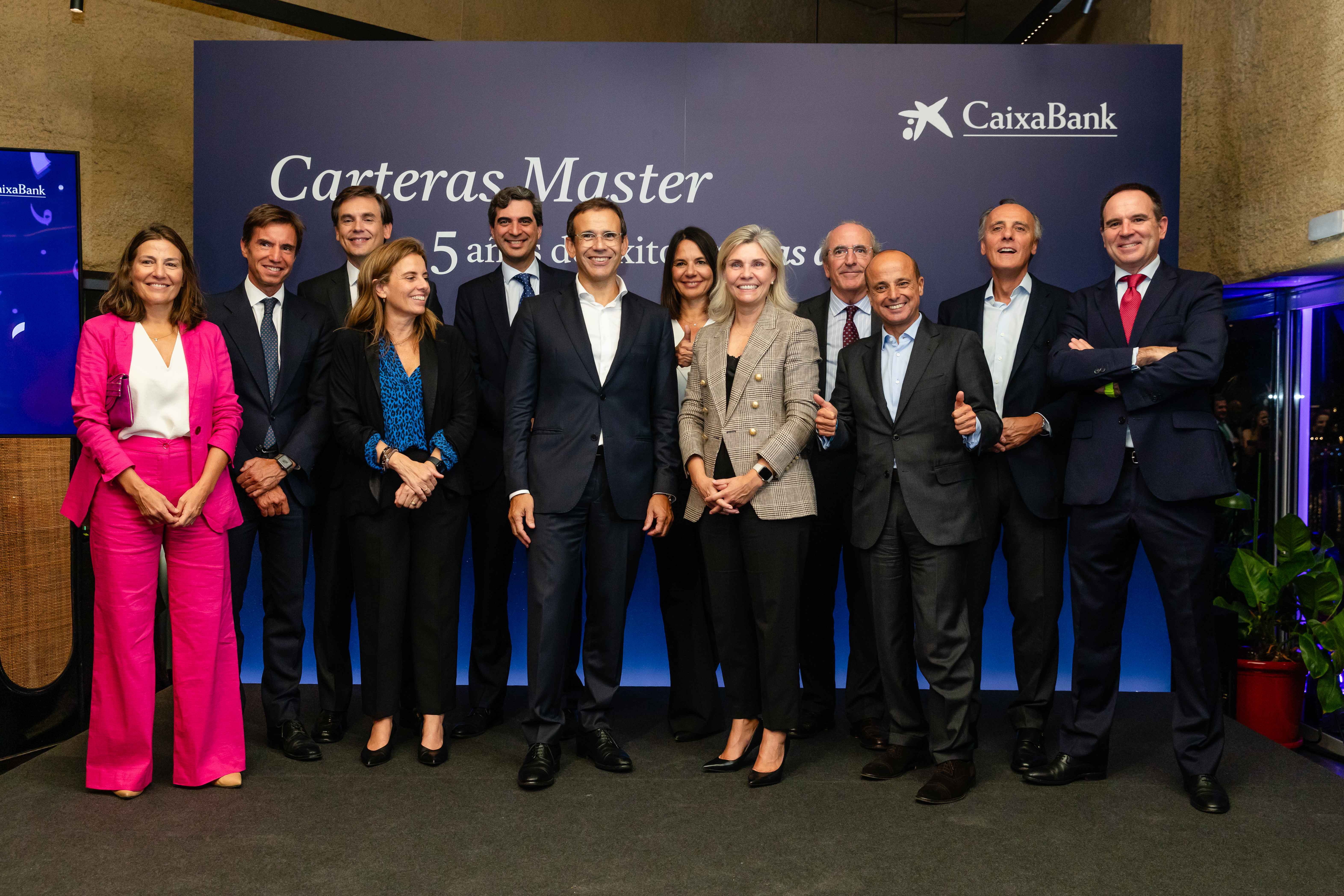 Representantes de CaixaBank y CaixaBank Asset Management junto con representantes de Amundi, JP Morgan, MSIM, Robeco y Nomura, durante la celebración del evento de aniversario de las carteras Master.