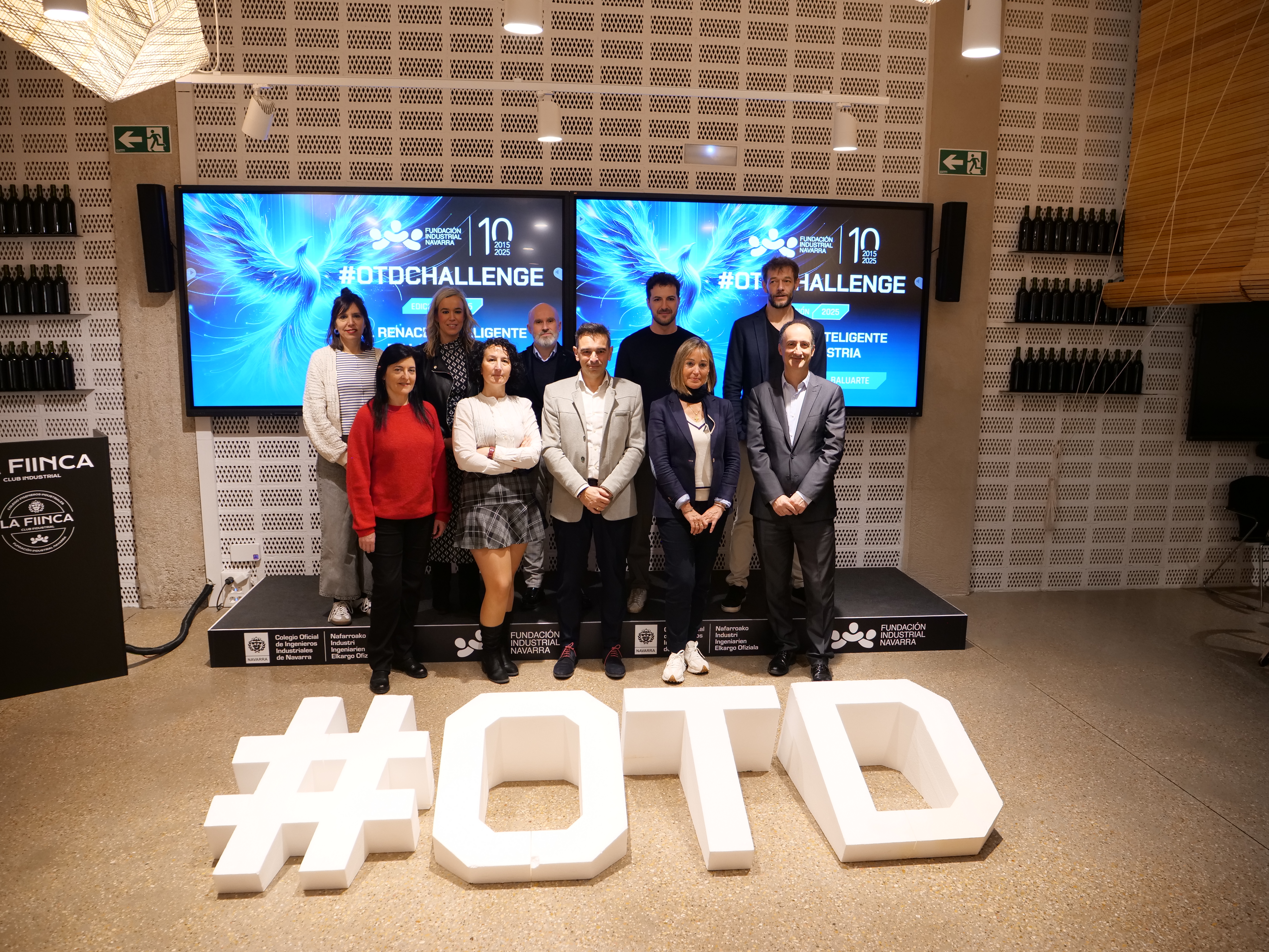 Eva Ontoria del Cura, Servicio Navarro de Empleo; Garbiñe Basterra, directora de Energía I+D+I Empresarial y Emprendimiento del Gobierno de Navarra; Joaquín Glaría, Euskaltel Navarra; Gonzalo Franco, Fundación Industrial Navarra y responsable del #OTDChallenge; Juan Ramón Aramendía, Nasertic; Rosa María Caballero, Gobierno de Navarra; Amaya Bengochea, Servicio Navarro de Empleo;  Roberto Rey, Entelgy; Elena Alemán, directora gerente de la Fundación Industrial Navarra; Juan Antonio Bombín, responsable de Desarrollo de Negocio de Empresas de la DT Ebro en CaixaBank