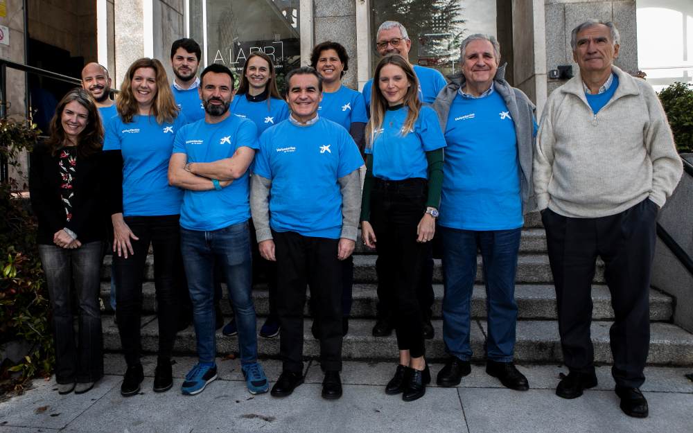Accionistes voluntaris participants a la jornada, amb Rafael Herrador, director territorial de CaixaBank a Madrid, i Meritxell Soler, directora de Relació amb Accionistes de CaixaBank