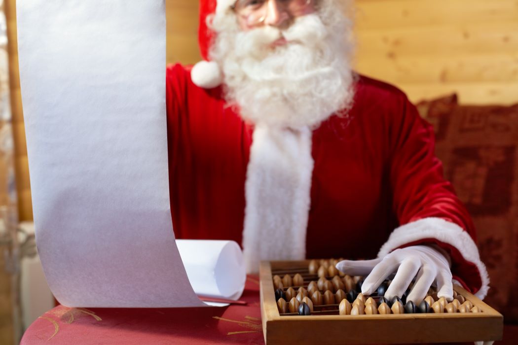 Pare Noel fent comptes amb un àbac